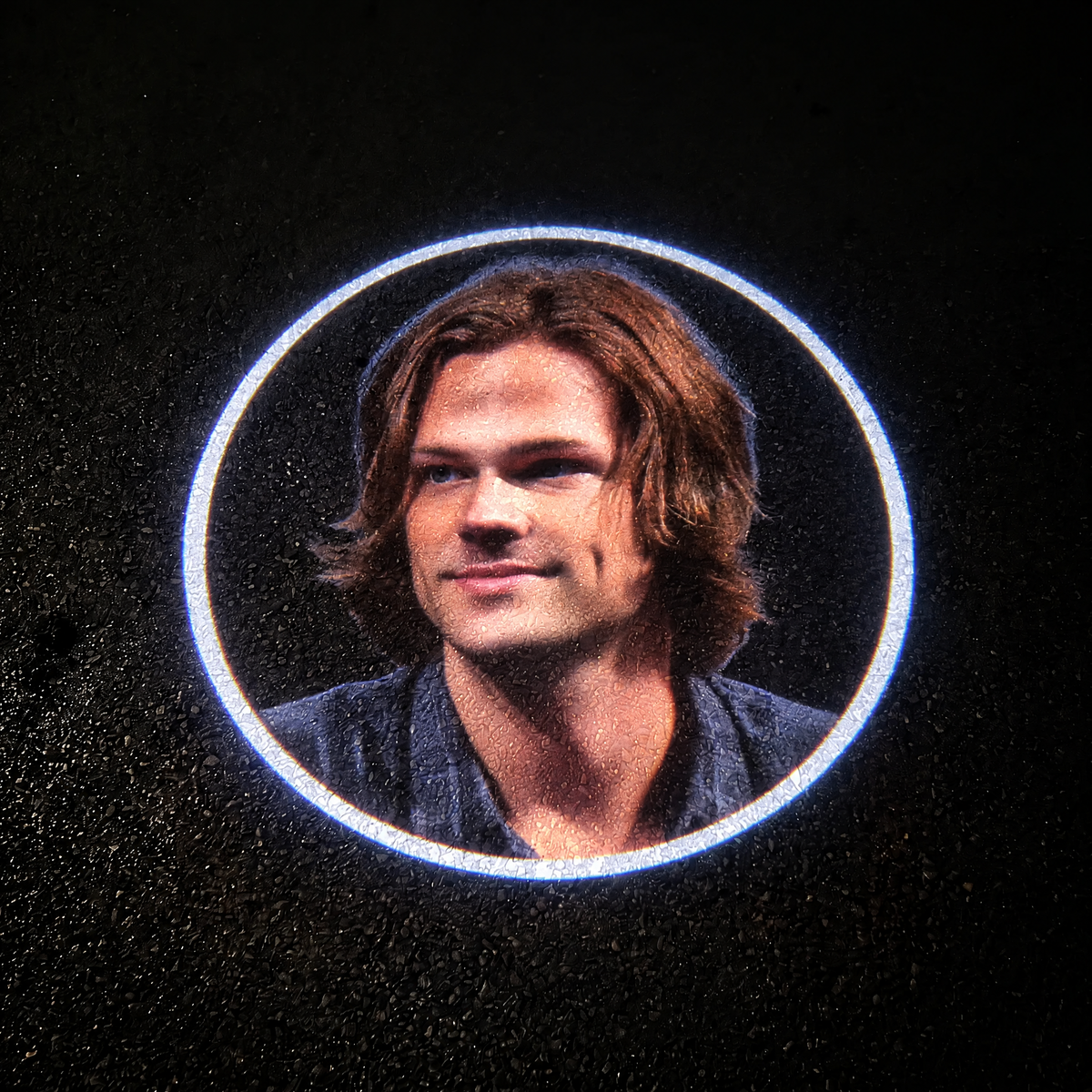 Sam Winchester projected on asphalt